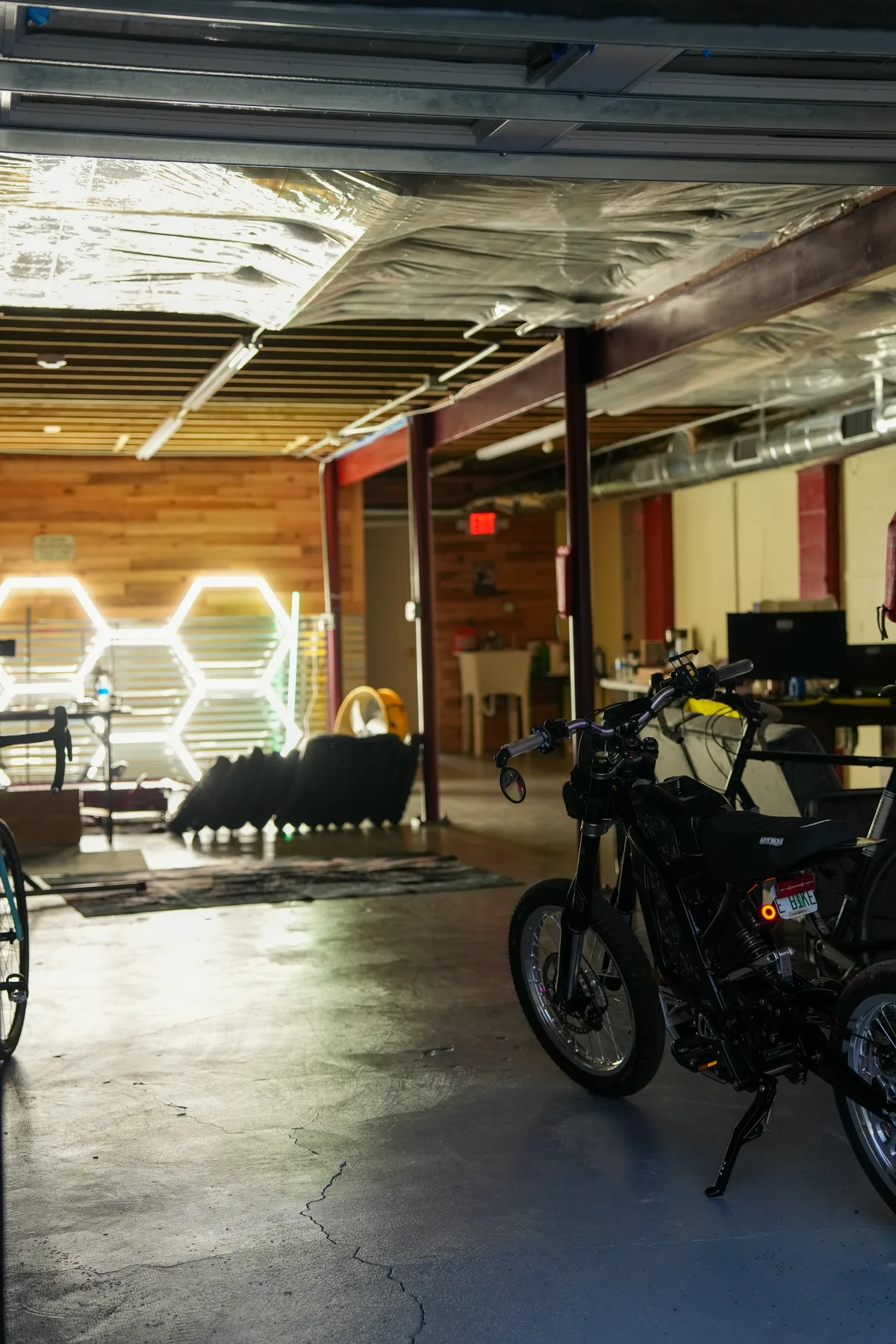 Inside the Tuned E-Bikes workshop with an e-moto and bikes