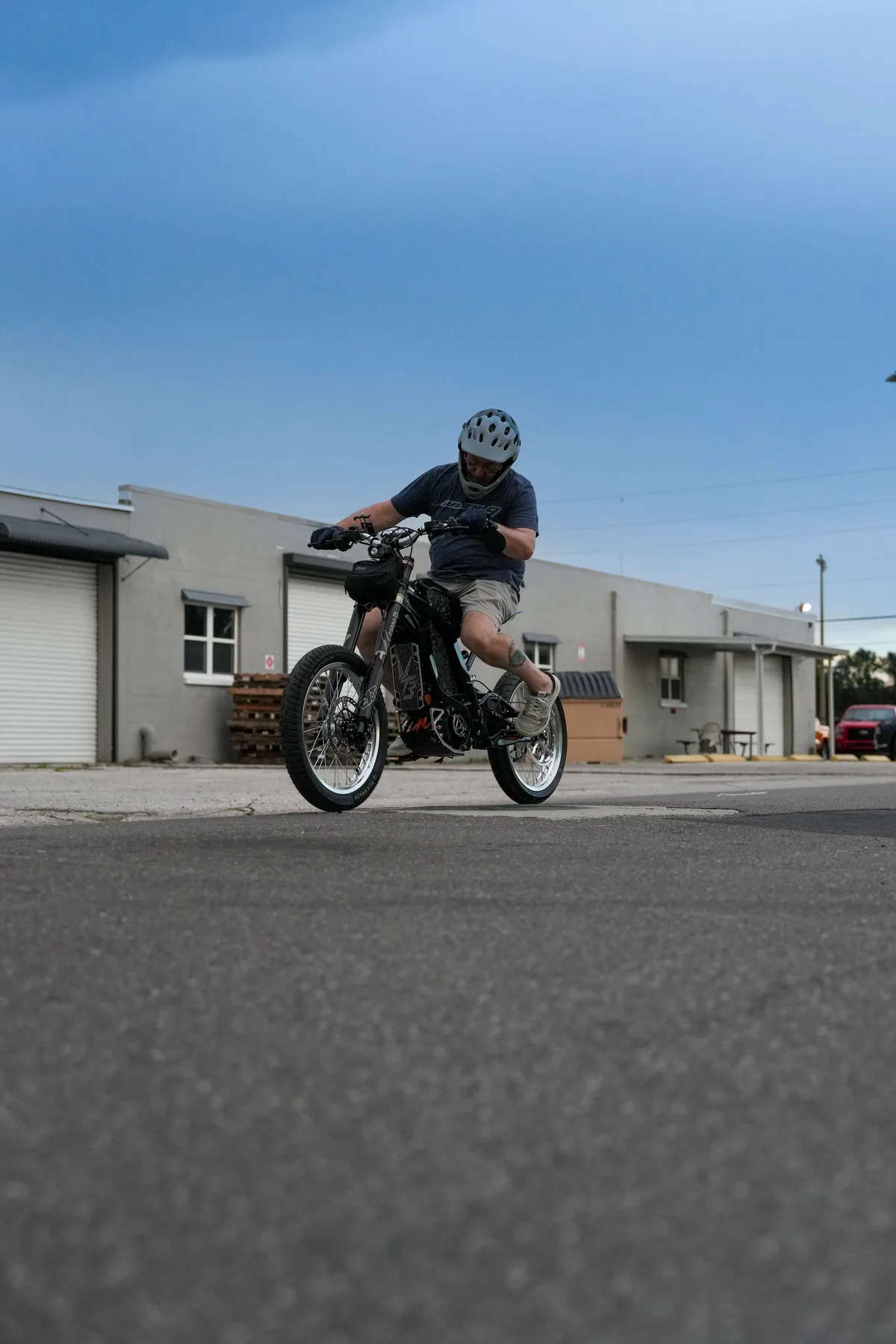 Rider testing an e-bike outside the shop